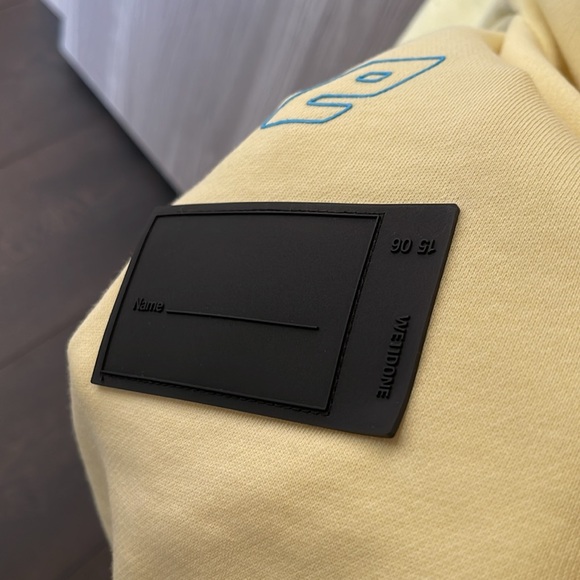 WE11DONE
Yellow Iridescent Logo Hoodie Size XS oversized - Picture 9 of 15